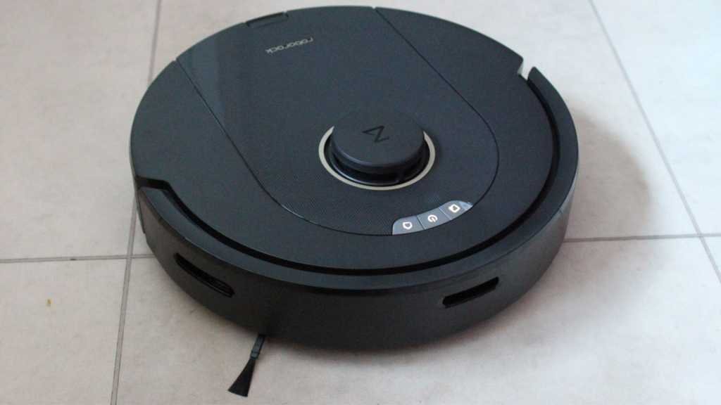 Roborock Q5 Pro robot vacuum on a tiled floor